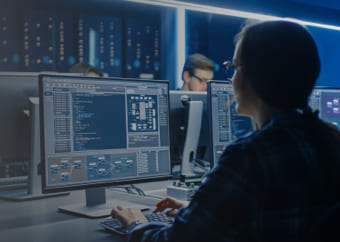 Woman using a computer in a compuer room