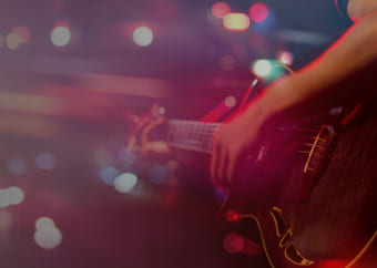 Musician playing a guitar