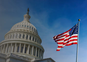 United States Capitol and an American flag