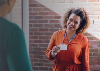 Social service worker greeting a patient